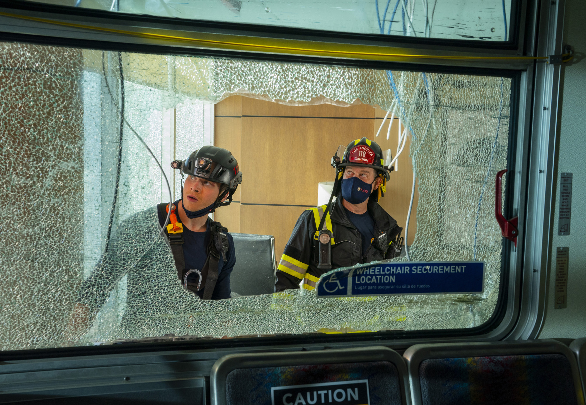 9-1-1: L-R: Oliver Stark and Peter Krause in the “New Abnormal” season premiere episode of 9-1-1 airing Monday, Jan. 18 (8:00-9:00 PM ET/PT) on FOX. CR: FOX. © 2021 FOX Media LLC.